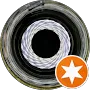 A close up of a tire with a star in the middle.